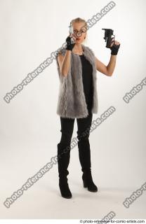 NIKOL STANDING POSE WITH TWO GUNS